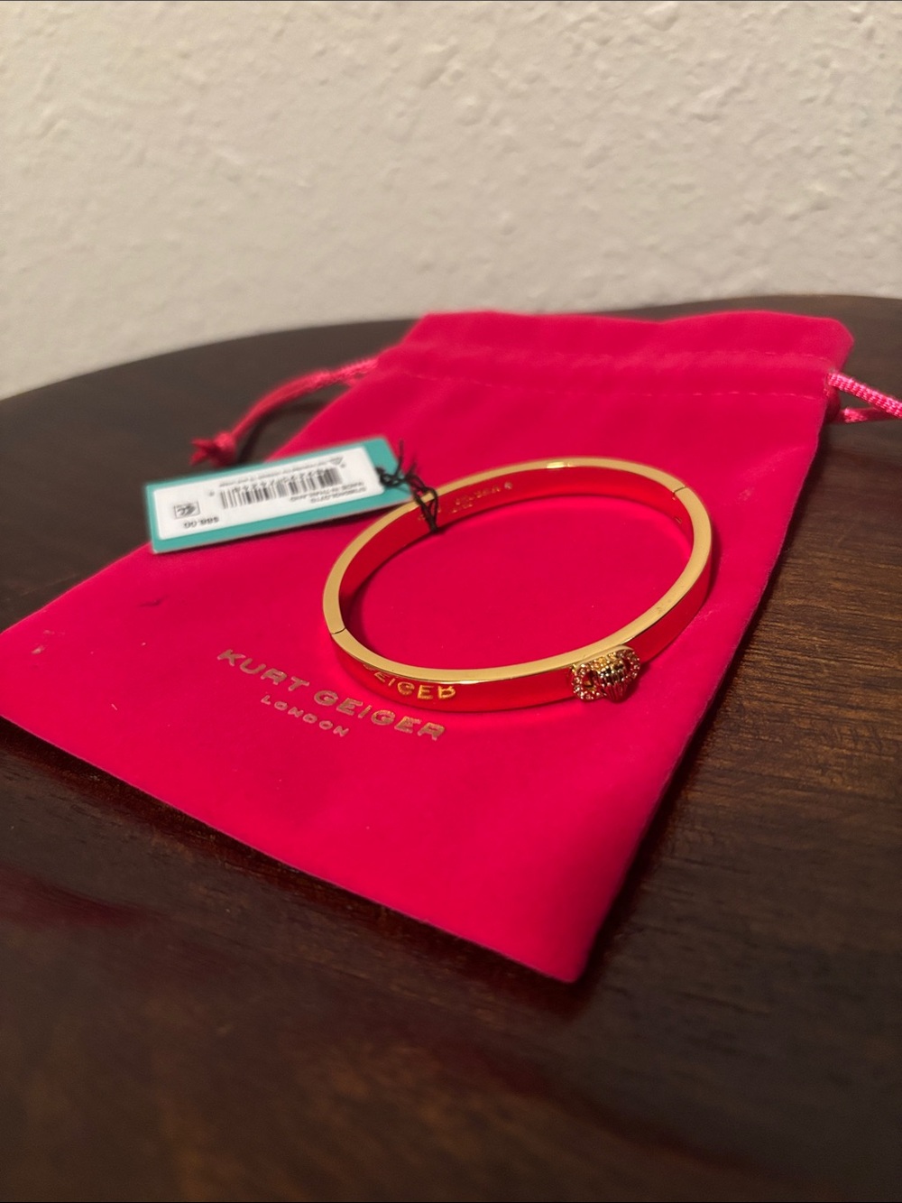 Kurt Geiger Gold Crystal Charm Bangle with Pink Pouch